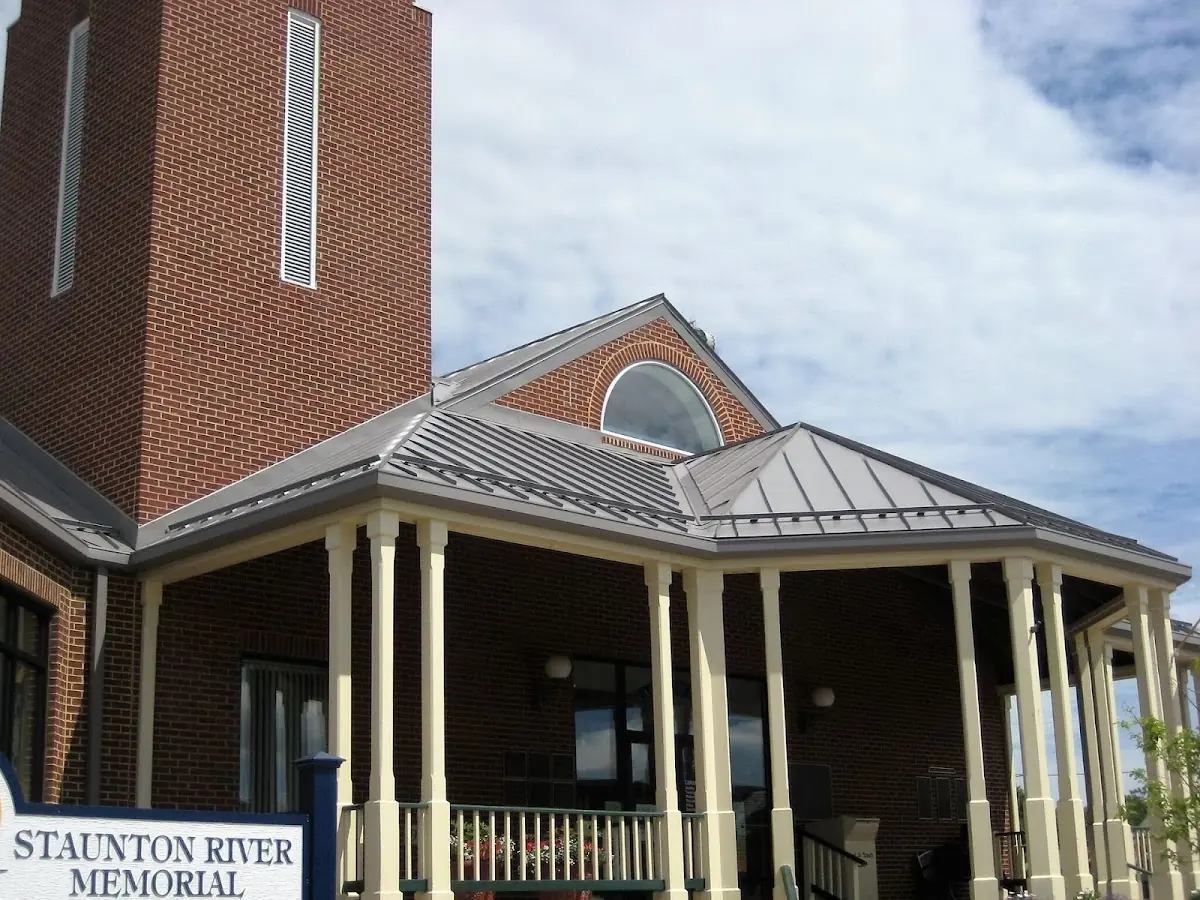 Skilled roofing craftsmen working on a residential roof in Fairview Park